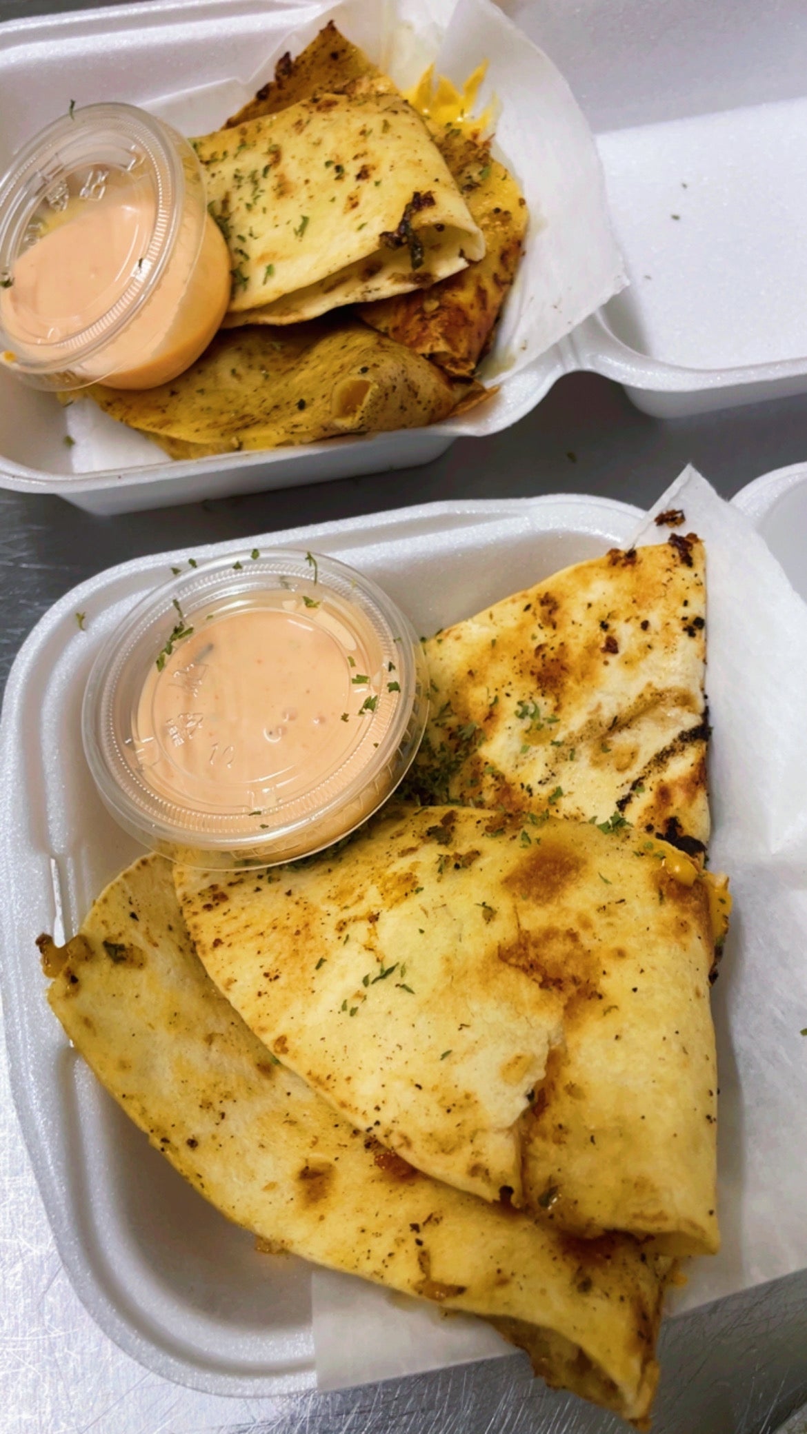 Bang Bang Shrimp Quesadilla with dipping sauce at Renew at Raspitality